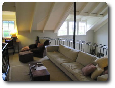 Lounge area under vaulted ceiling