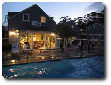 Dusk settling over buildings and swimming pool