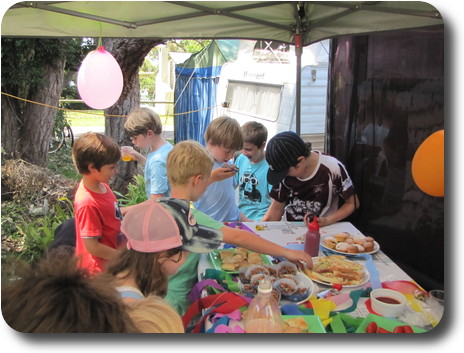 Children helping themselves to the food