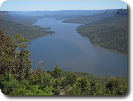 View from cliff top showing water in deep valley