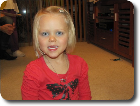 Little girl with silver necklace and her name 