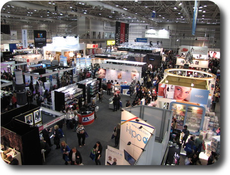 Large floor with multiple booths and displays of fashion items