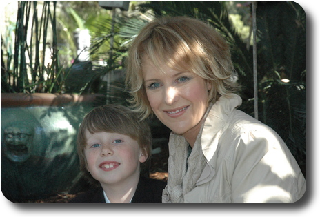 Mother and son in lush garden