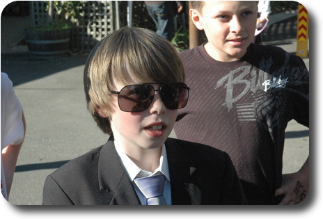 Little boy with big sunglasses on