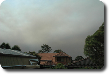 View of sky, showing dark clouds which is smoke from fires