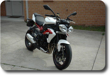 White motorcycle - from right front