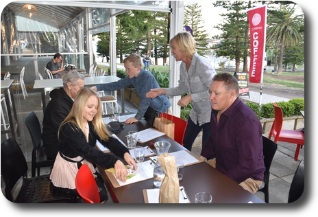 Lily, Peter, Cooper, Kelly and Glenn at restaurant table