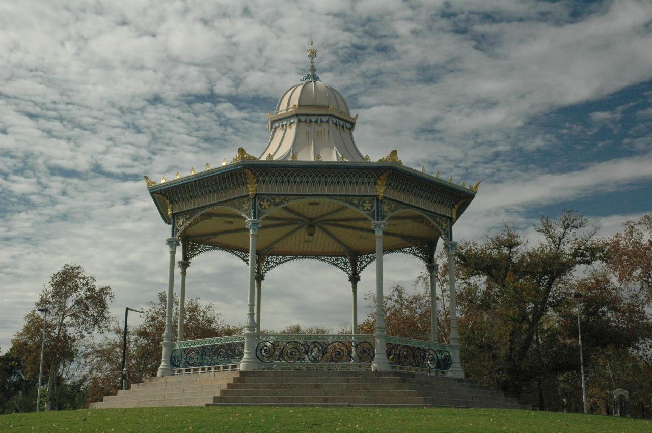 Rotunda in park, light green columns, white domed roof
