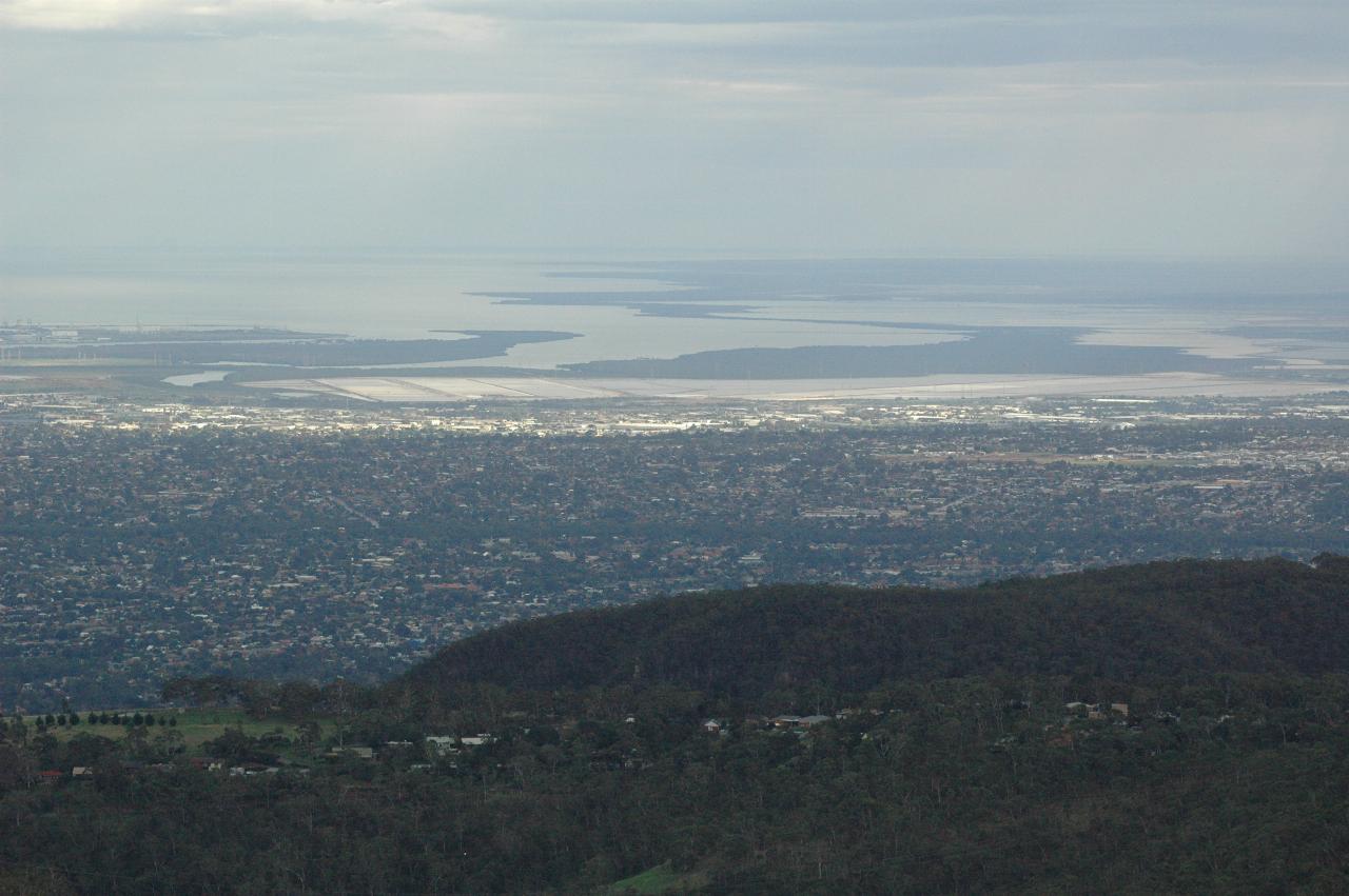 Foreground hill, plain behind with port of Adelaide and islands