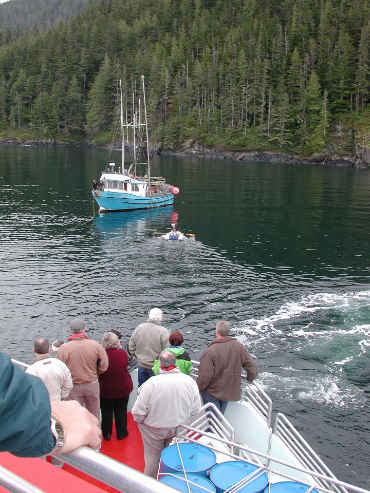 Rope attached, starting to tow boat away from the shore