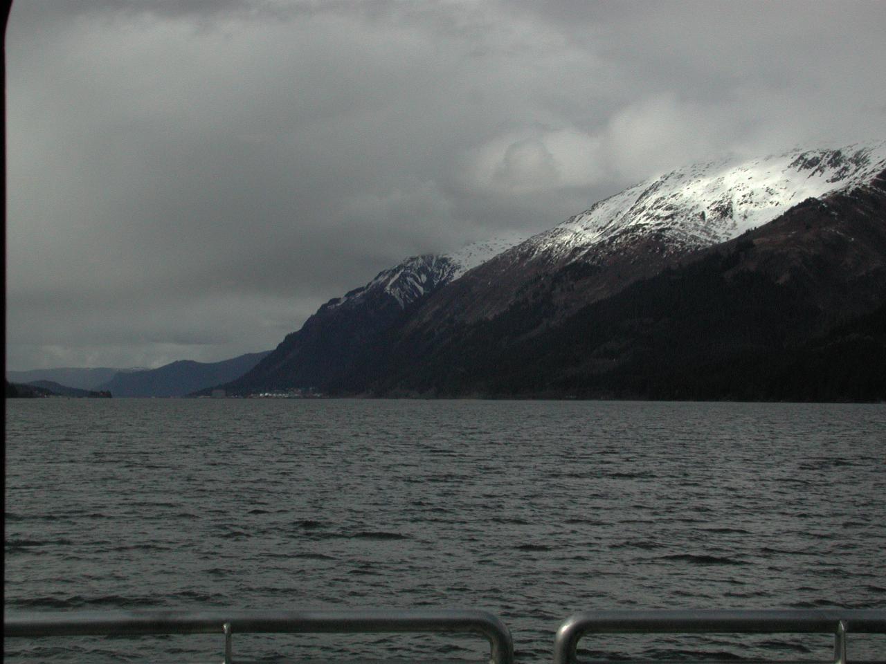 In the Gastineau Channel, approaching Juneau; Mt. Roberts with snow