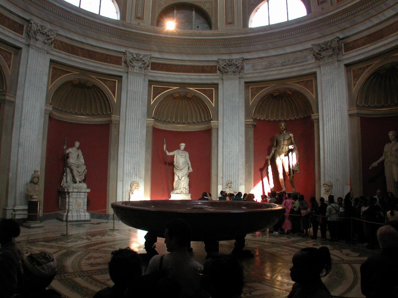 A huge bath and assorted Roman Statuary in the Round Room