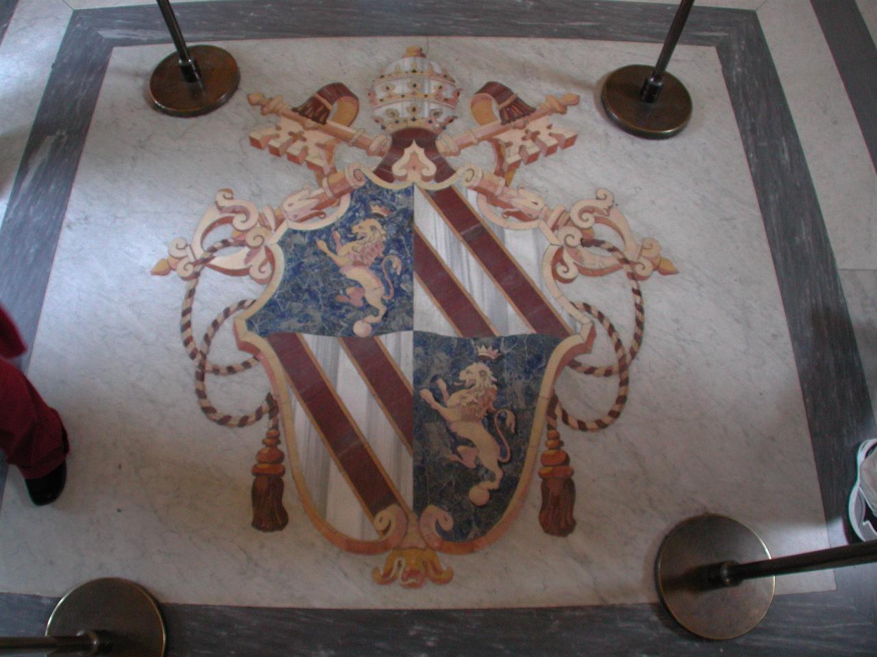 Another papal crest on the floor