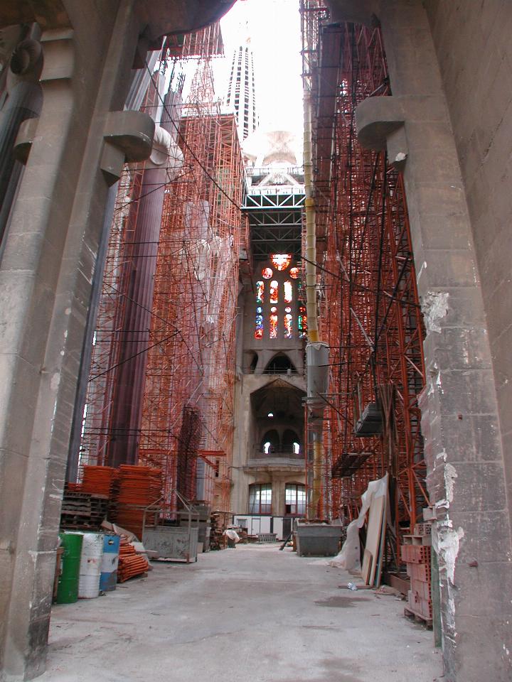 Construction work and stained glass window in Gaudi's 