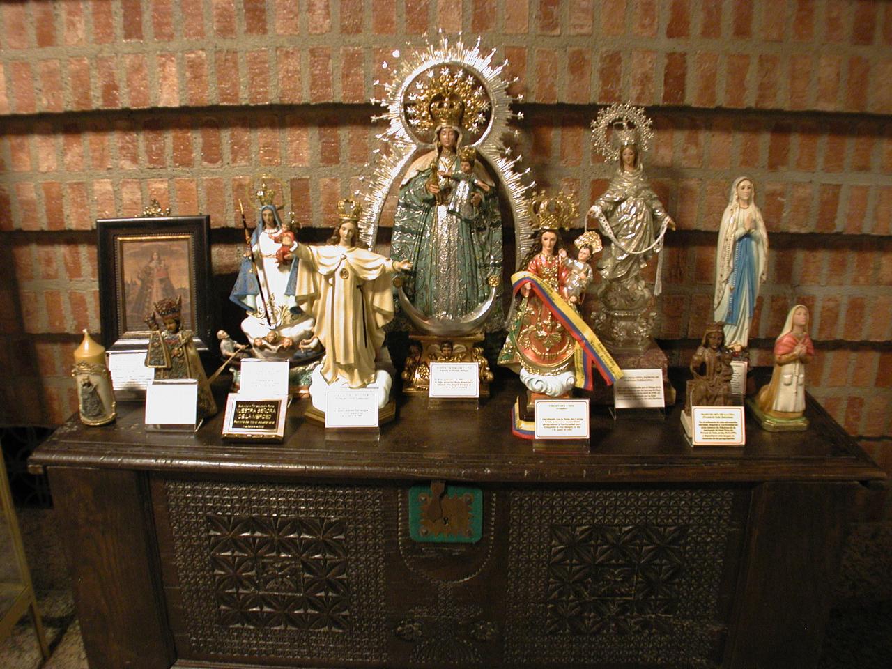 Assorted statues bought by pilgrimages to Torreciudad Shrine