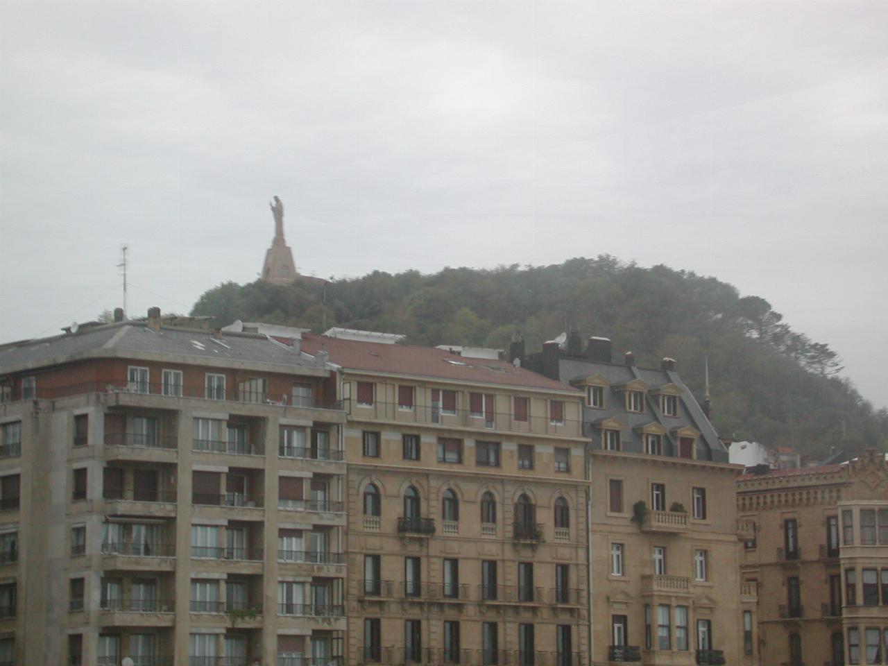 Large statue on hilltop overlooking San Sebastian, Spain