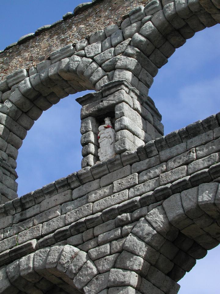 Roman viaduct/aqueduct at Segovia including a statue (of the BVM?)