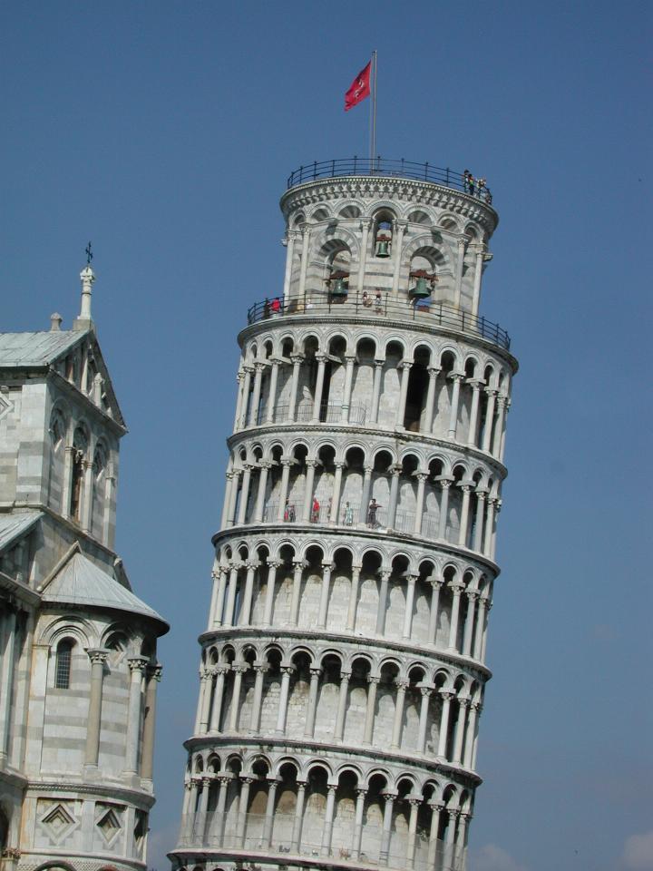 Leaning Tower relative to Pisa Cathedral and also showing tourists on tower