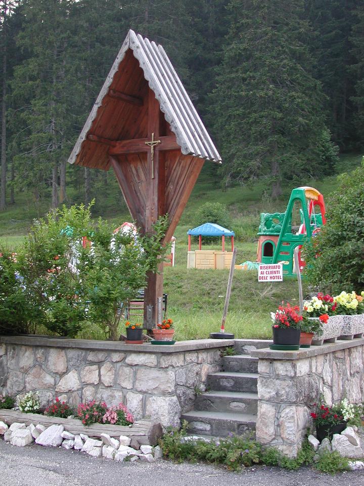 Hotel Paradiso's play area, and road side shrine, quite common in this area