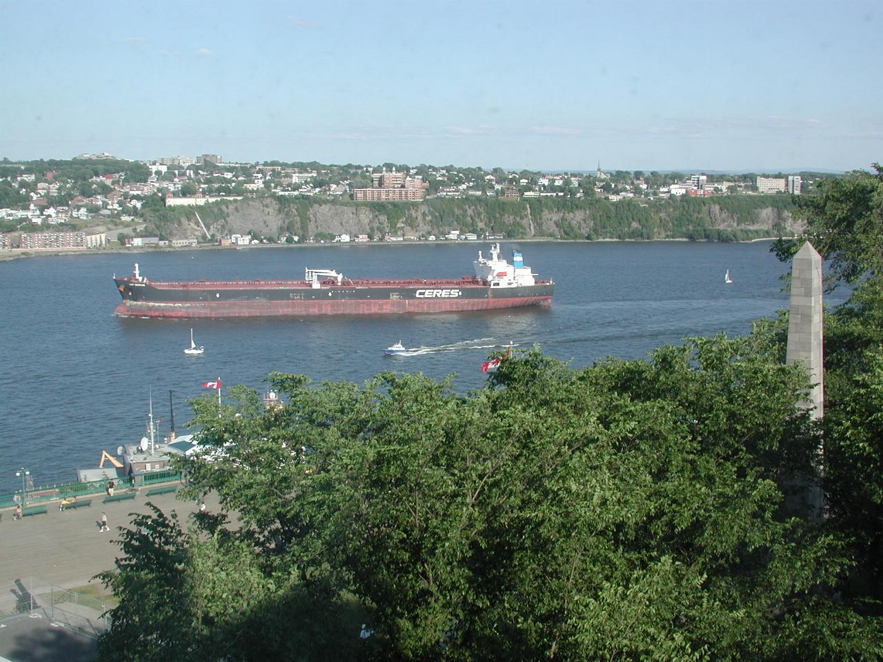 Large ship heading along St. Lawrence River towards ocean, as seen from my room at Chateau Frontenac