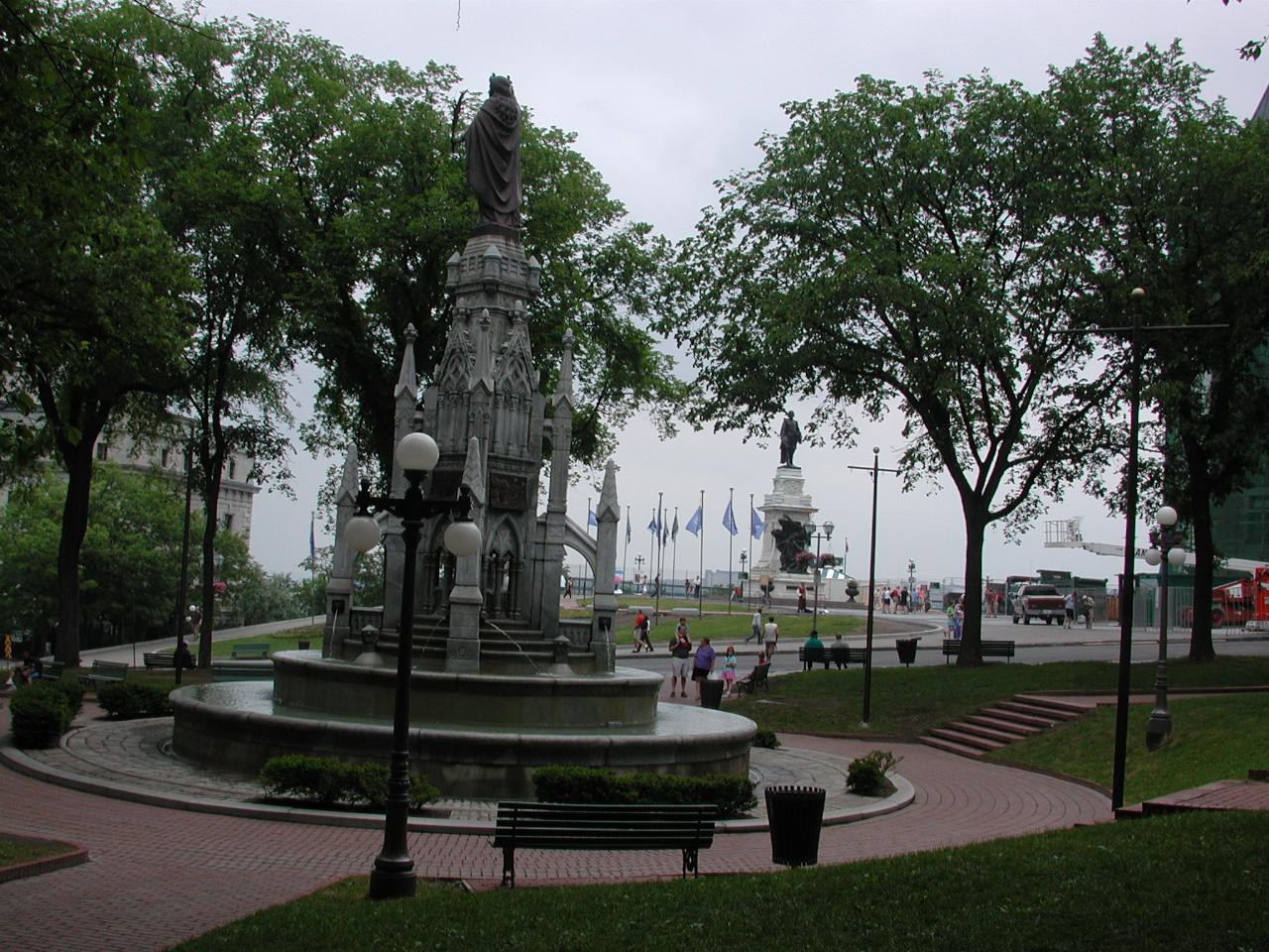 Champlain's statue looking at Recollect Monks monument in Place d'Armes