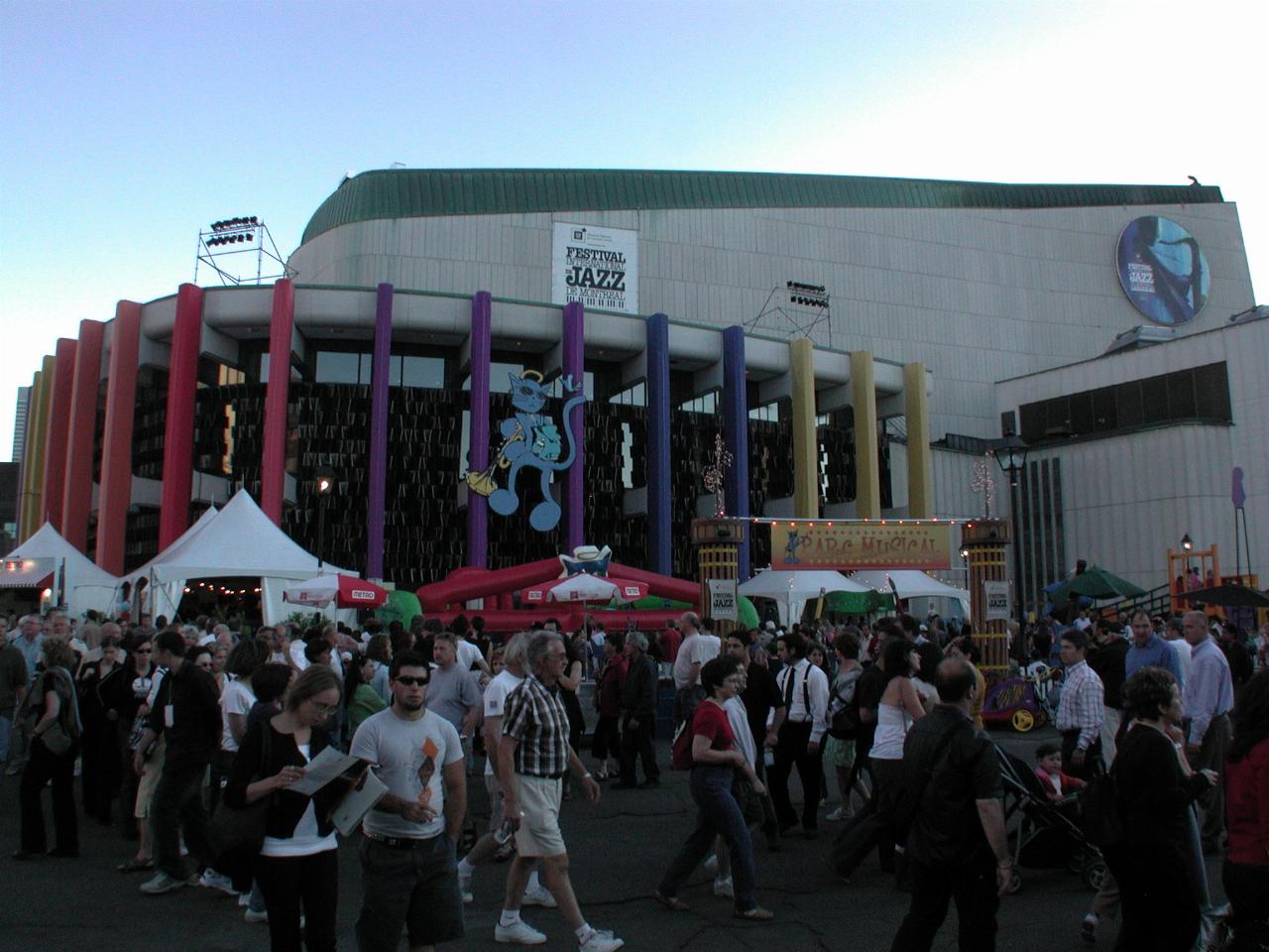 Main theatre at Place des Arts, featuring the Festival mascot 