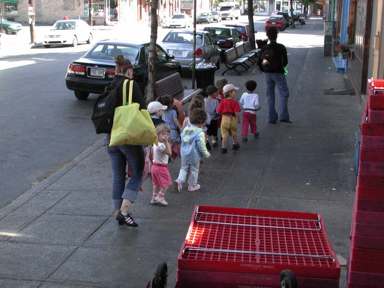 Quebec law requires pre-school kids be taken out for socialising - in a group, tied together!