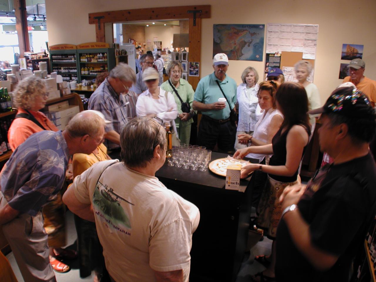 Wine and cheese tasting at store near market in suburban Montreal