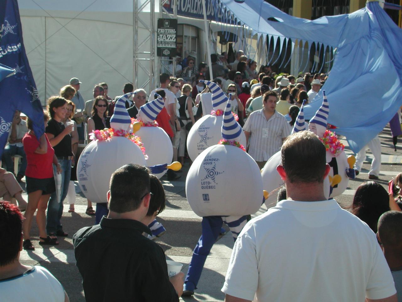 The Festival Parade starting on Rue Sainte Catherine and working through Place des Arts to Boul de Maisonneuve