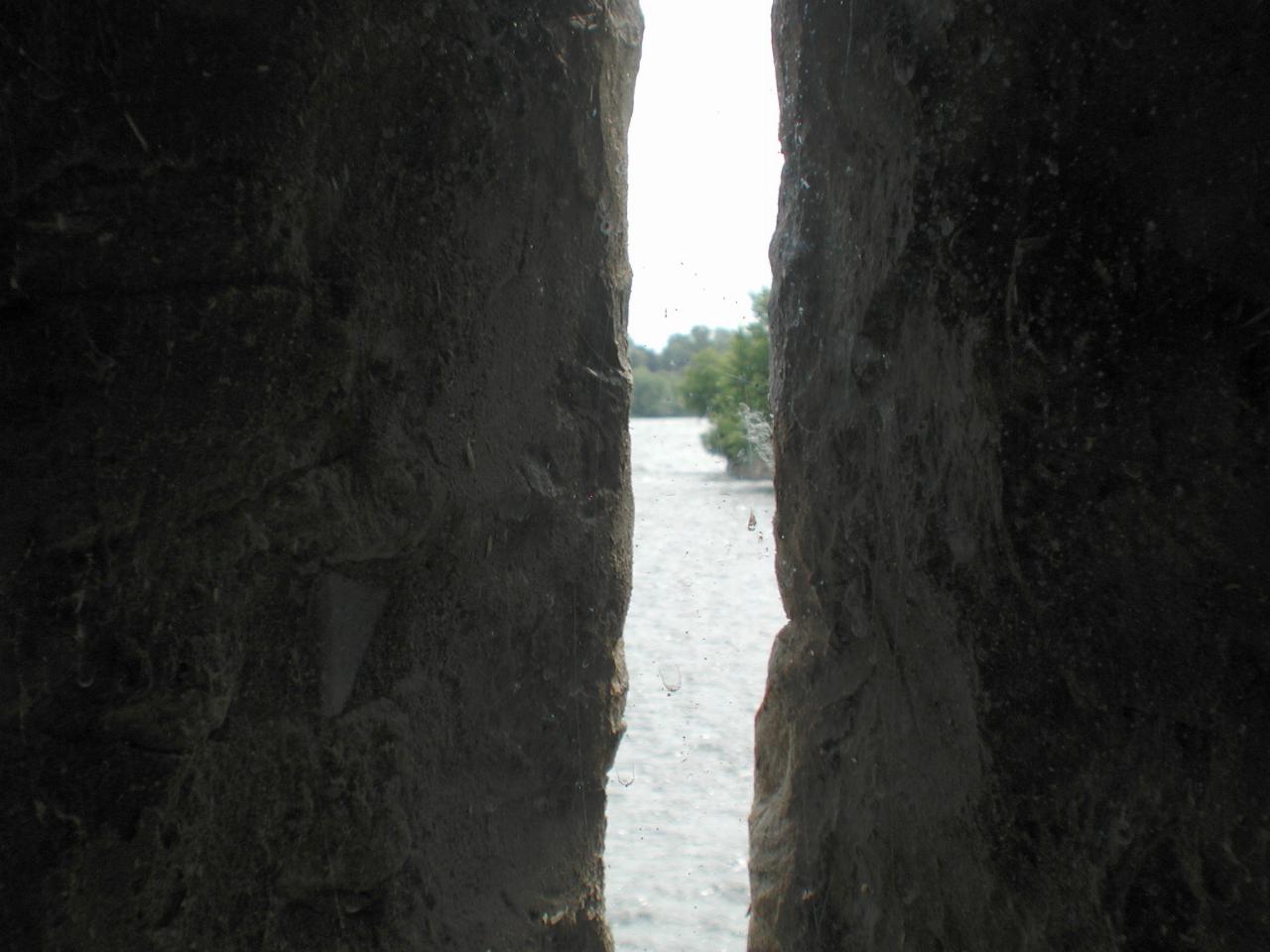 View through the slit, showing the river coming down towards the Fort