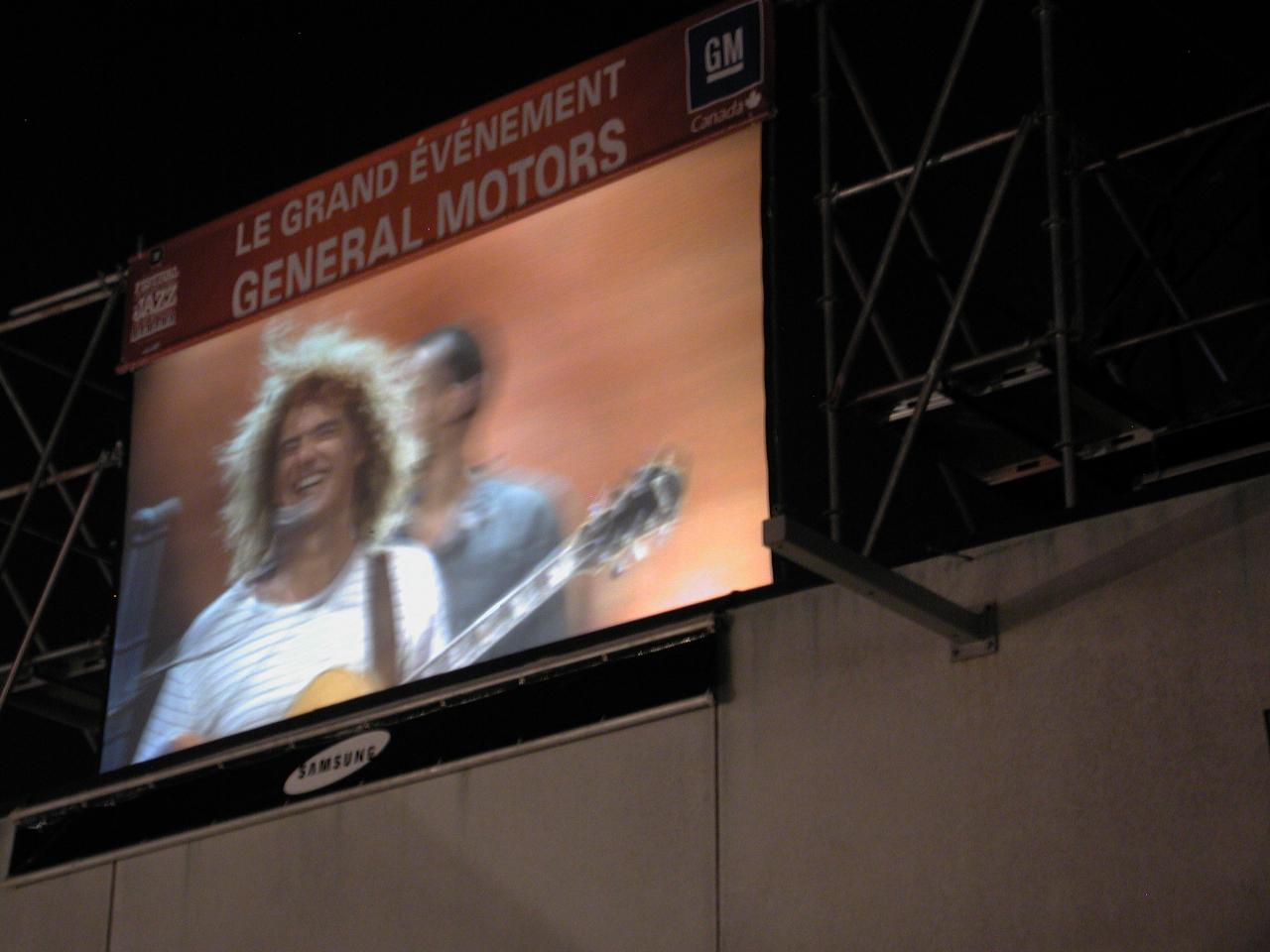 TV screen showing Main Stage performance: final concert by Pat Metheney