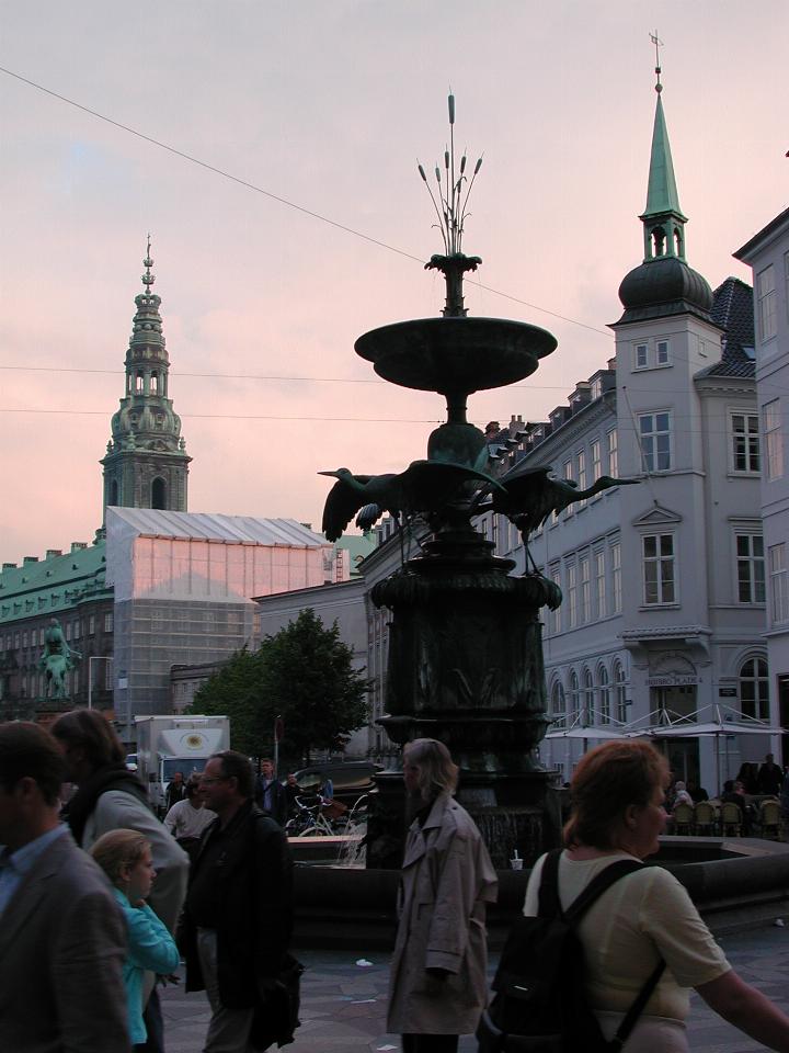 KPLU Viking Jazz: Storks Fountain at the centre of Amagertov (Strøget) back to hotel, Christiansborg Slot in background