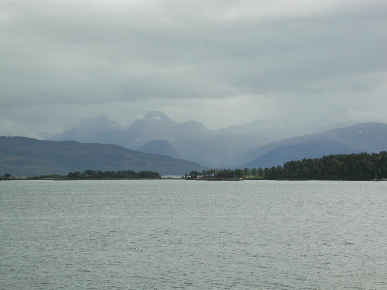 KPLU Viking Jazz: Close up of rain in the hills across the fjord from Molde