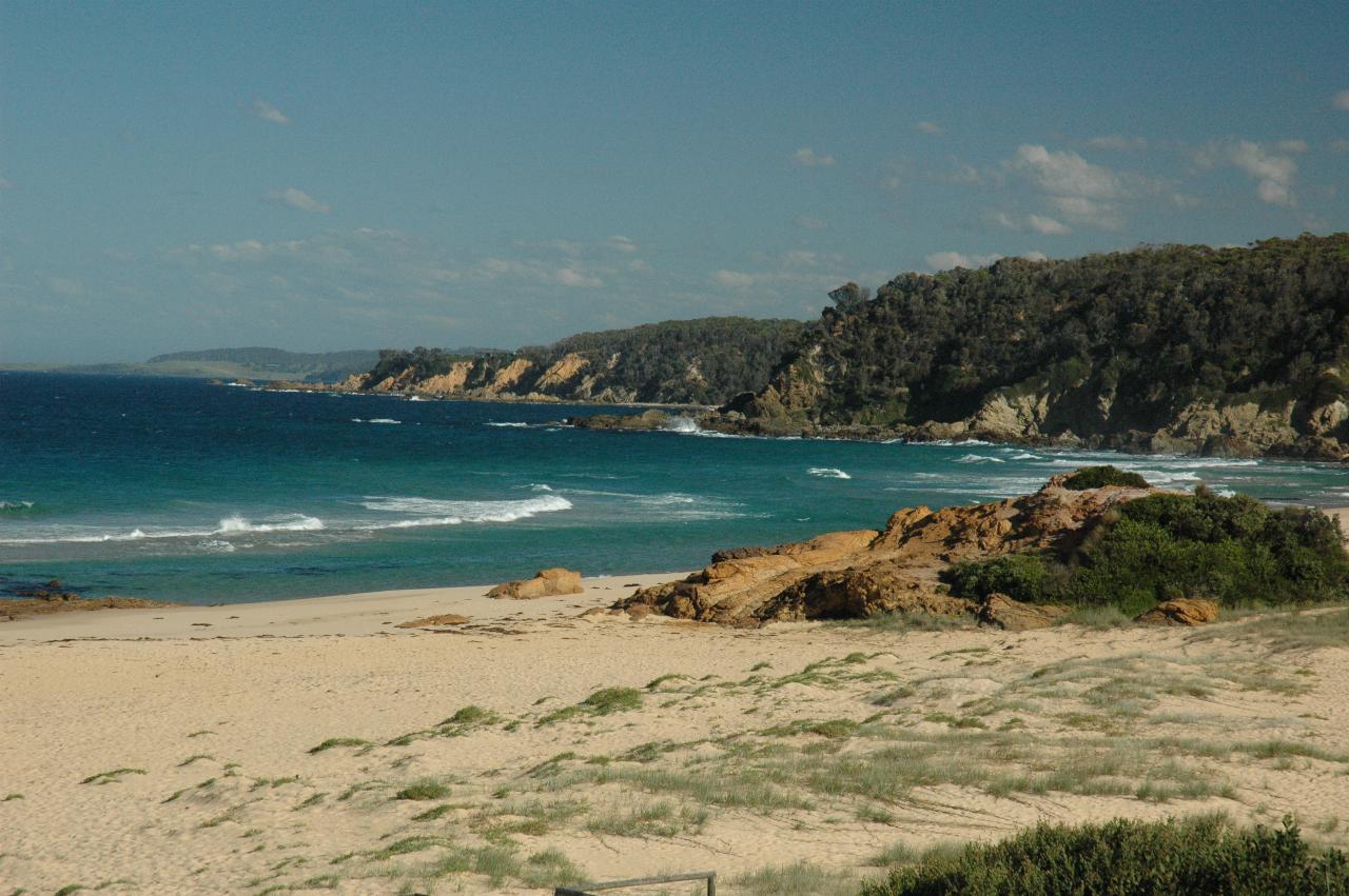 Beach scene, waves and headlands along coast